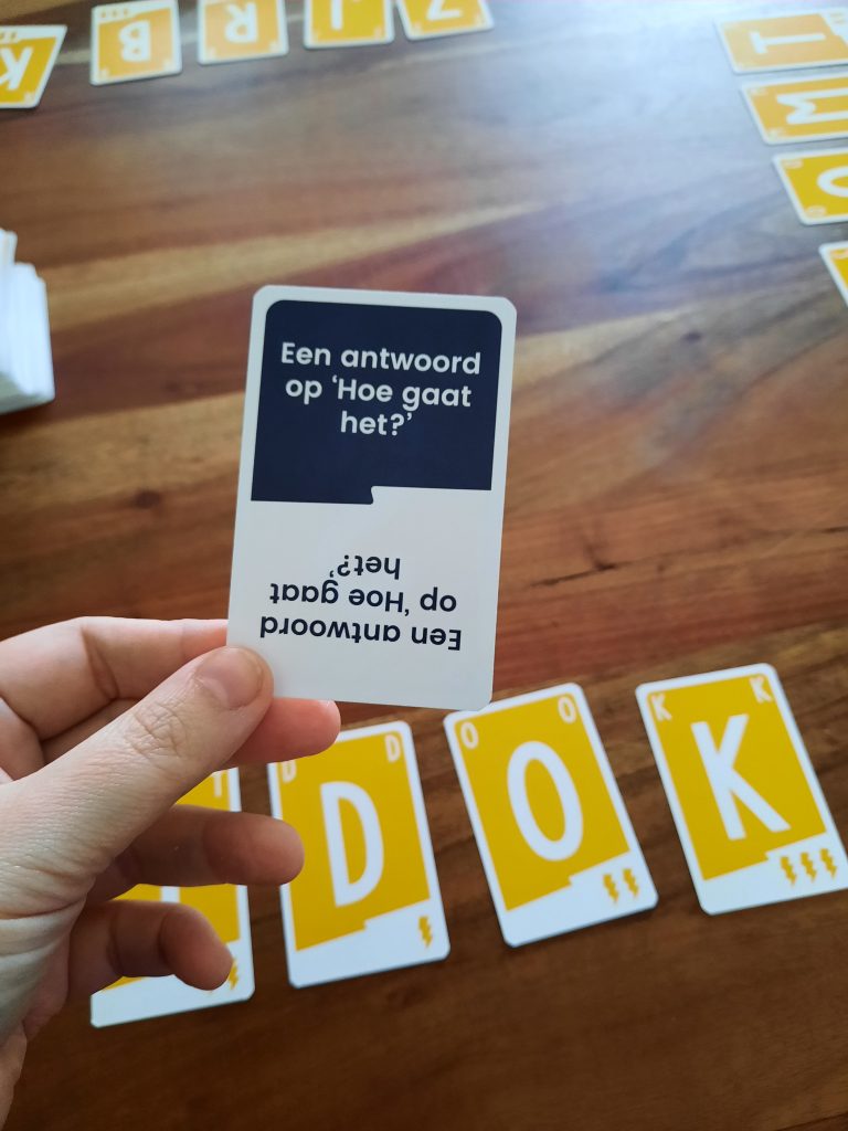 kaartspel Quickstop met de tekst 'Een antwoord op Hoe gaat het'